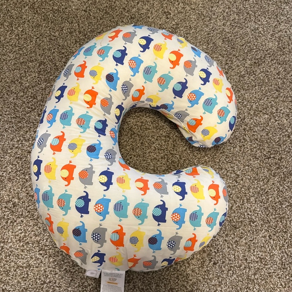 Boppy nursing pillow for baby with elephant cover